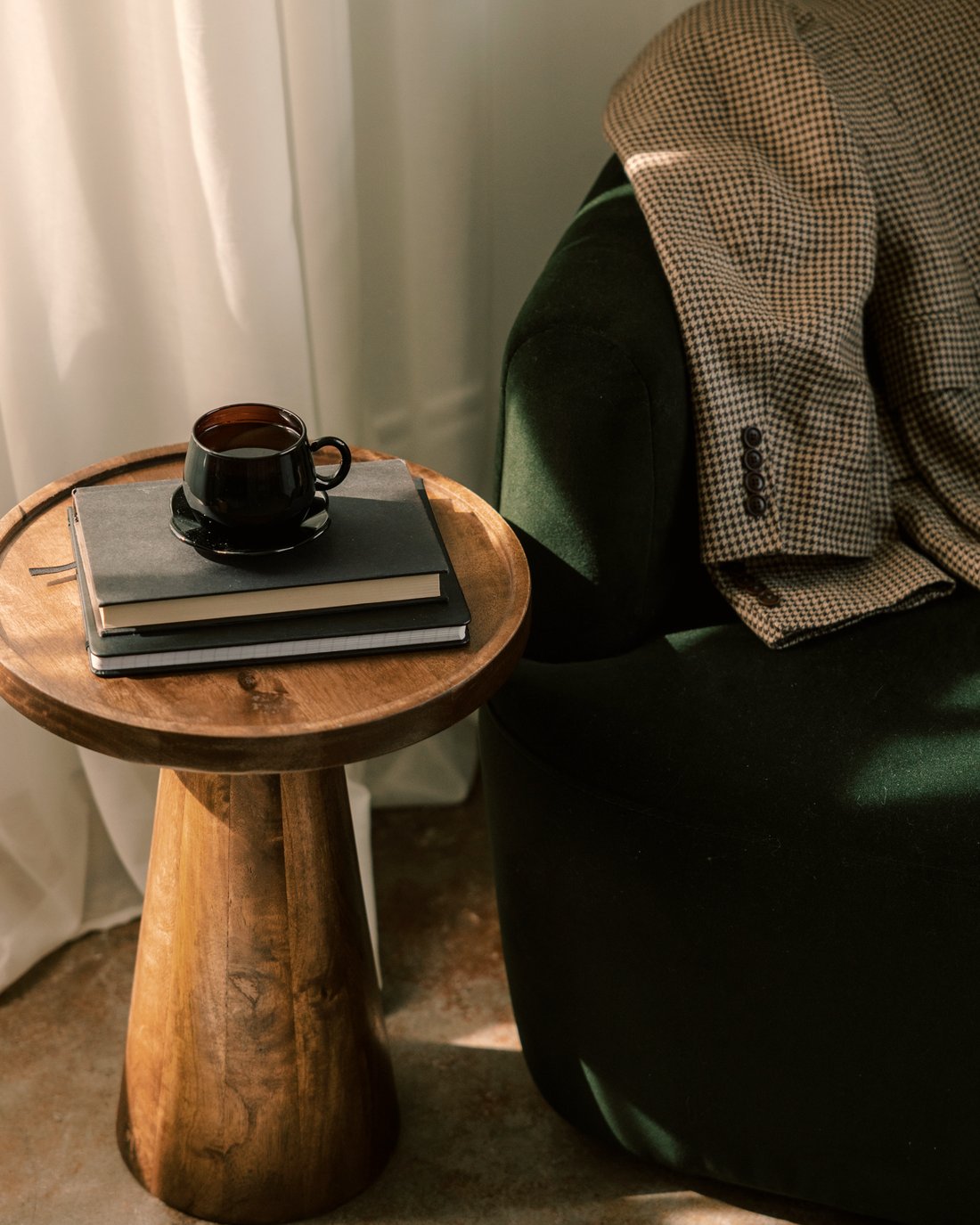 A quiet reading corner with coffee and books